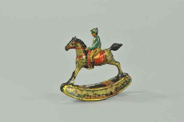 Appraisal: JOCKEY ON HORSE ROCKING PENNY TOY Meier Germany lithographed tin