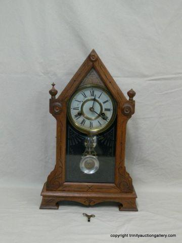 Appraisal: Antique Victorian Eastlake Mantle Clock - Mahogany steeple style frame