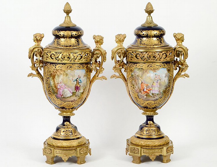 Appraisal: FINE PAIR OF SEVRES ORMOLU-MOUNTED PORCELAIN URNSLate th Early th