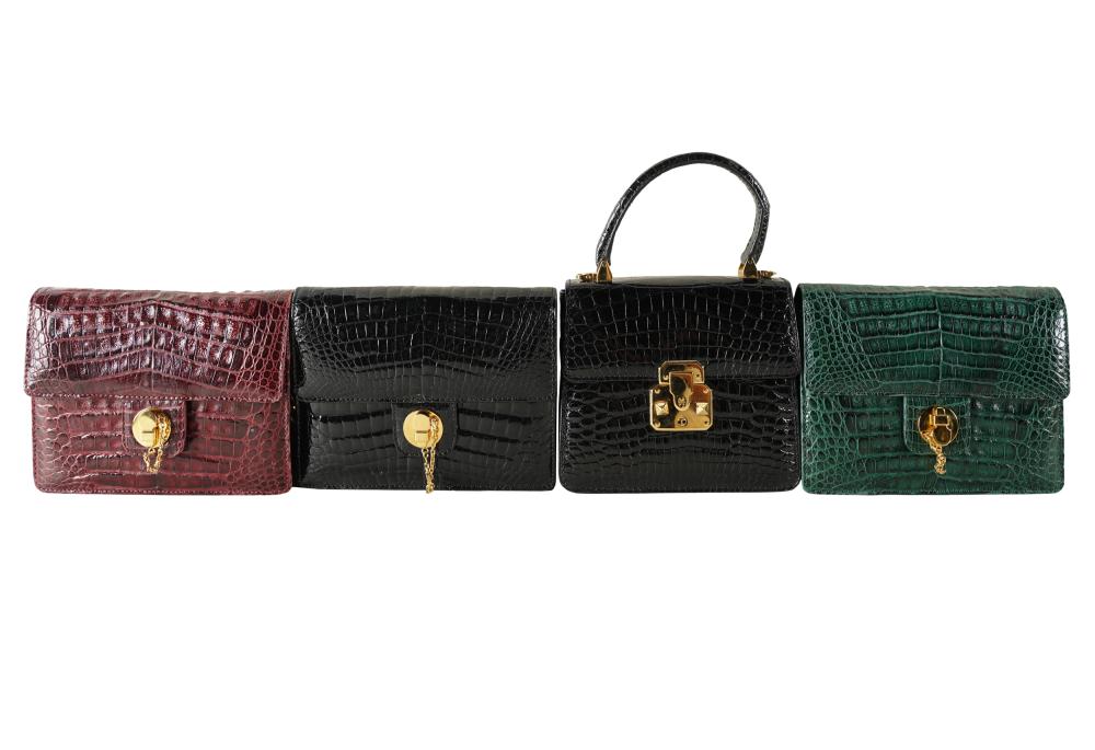 Appraisal: FOUR SMALL KWANPEN LEATHER PURSESeach with label Provenance Estate from