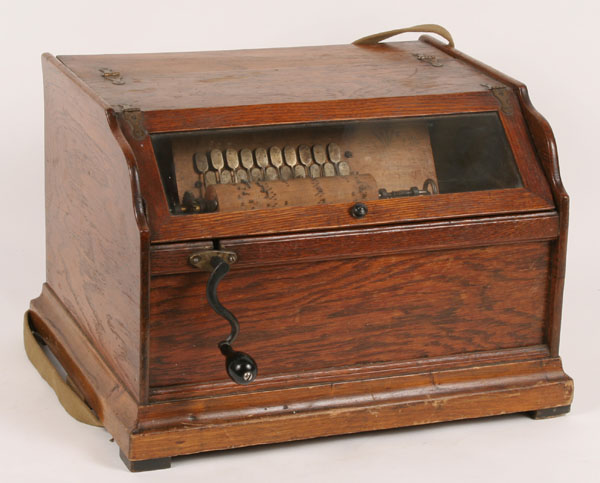 Appraisal: Cylinder hand crank music box in oak case with air