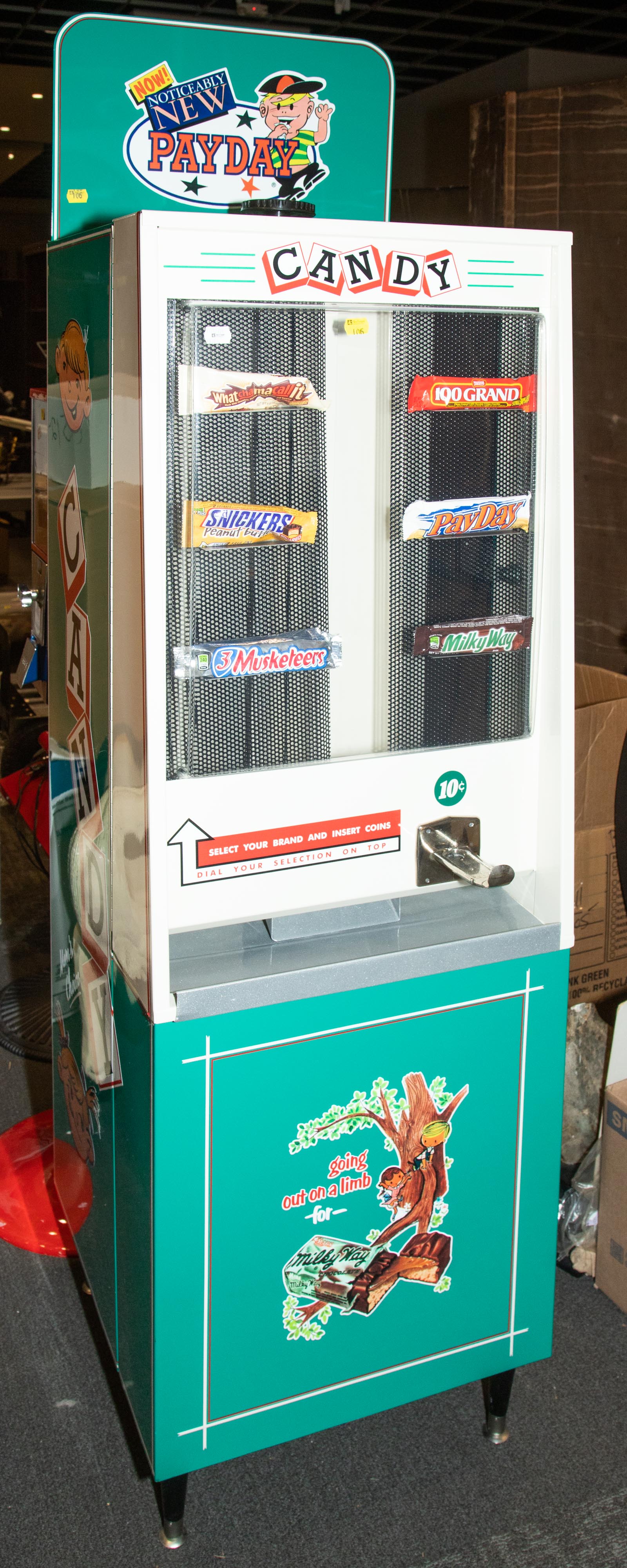 Appraisal: ENAMELED METAL CENT CANDY VENDING MACHINE in H in W