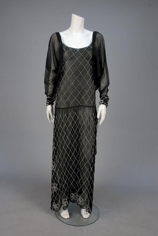 Appraisal: CRYSTAL BEADED EVENING GOWN c Black chiffon having dolman sleeve