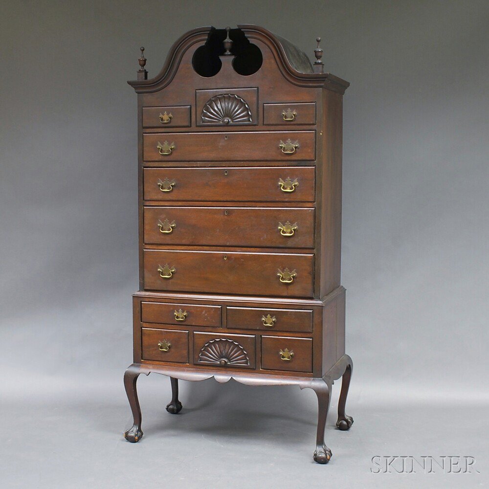 Appraisal: Chippendale-style Mahogany Bonnet-top High Chest the upper section with broken-arch