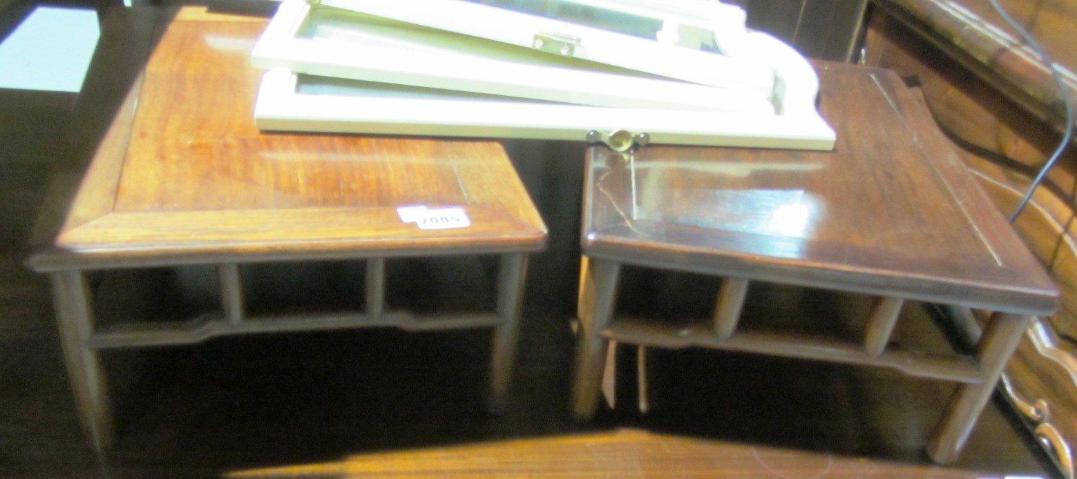 Appraisal: A pair of Chinese hardwood small low rectangular tables