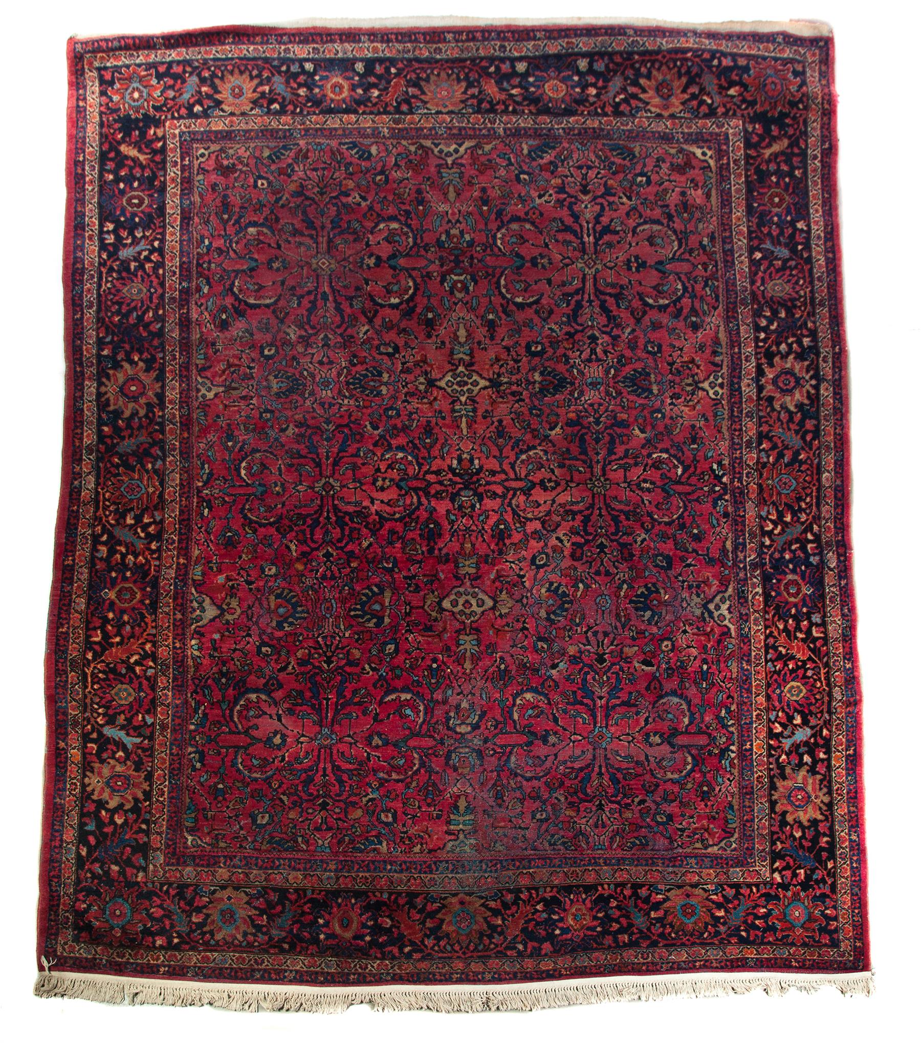 Appraisal: ORIENTAL RUG Mid th century Room size Sarouk with plum