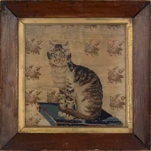 Appraisal: Needlework of a cat seated on a pillow early th