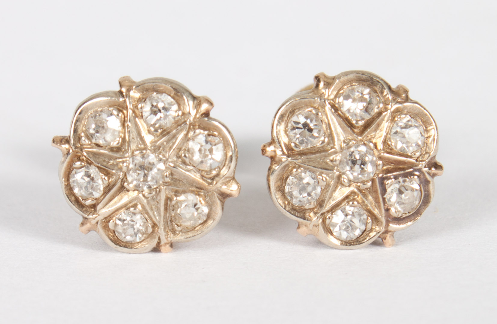 Appraisal: Lady's K gold diamond post earrings K gold diamond flower-shaped