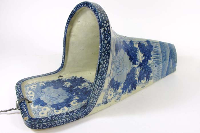 Appraisal: JAPANESE POTTERY WALL MOUNTED URINAL in blue and white hand