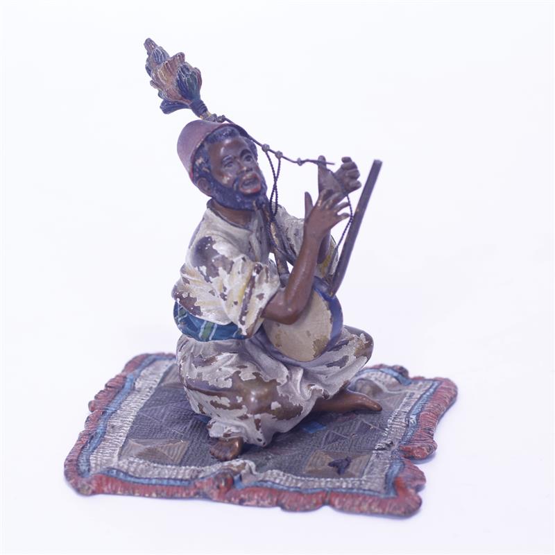 Appraisal: Austrian Bronze Cold Painted Orientalist Arab Musician Figure on Carpet