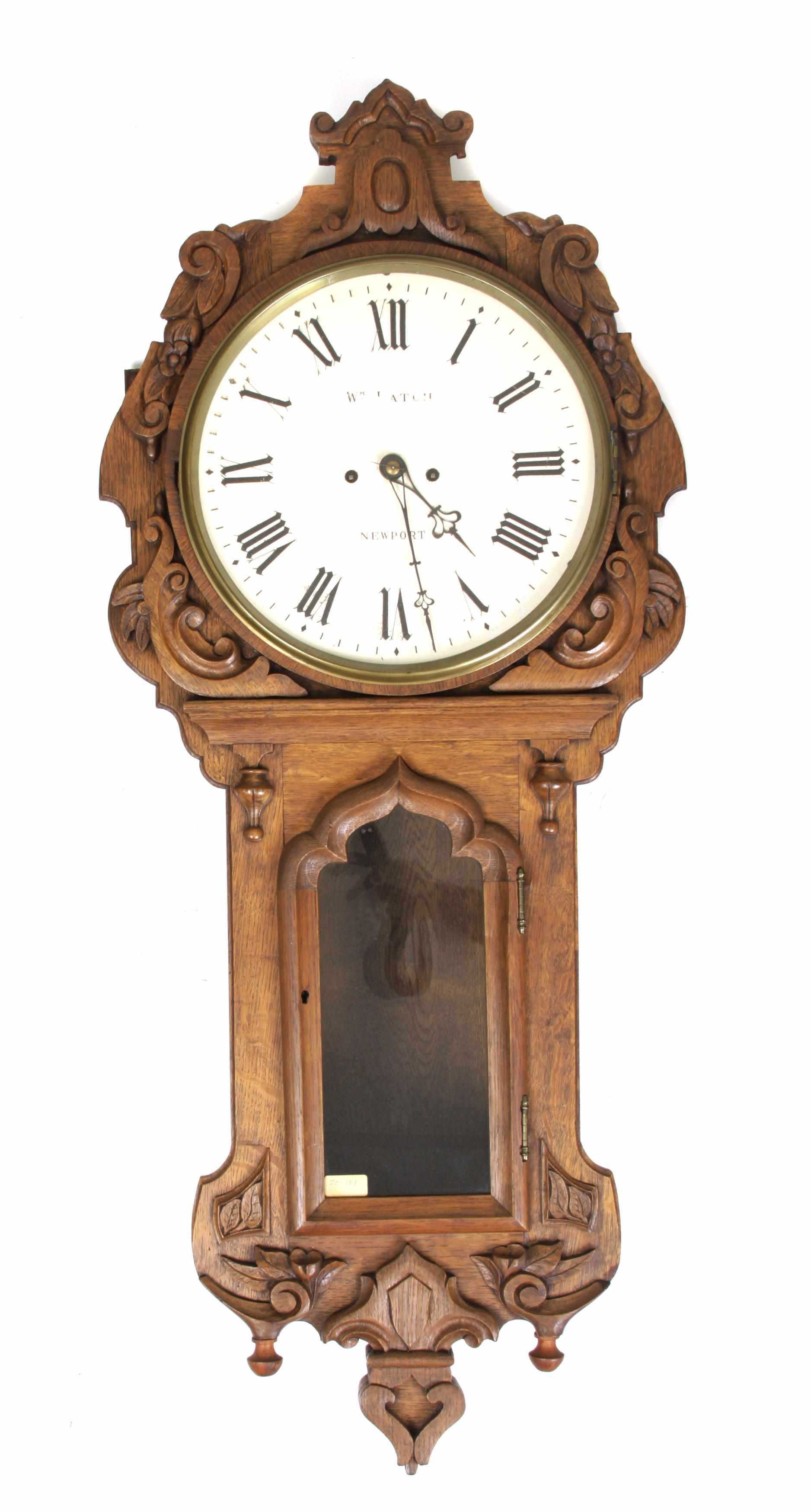 Appraisal: A Victorian carved oak wall clock Signed to dial WM