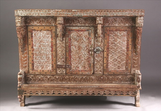 Appraisal: INDIAN CARVED WOOD CABINET Rectangular outline with one door carved