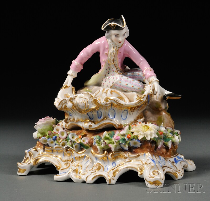 Appraisal: Jacob Petit-style Porcelain Figural Sweetmeat Dish Continental th century modeled