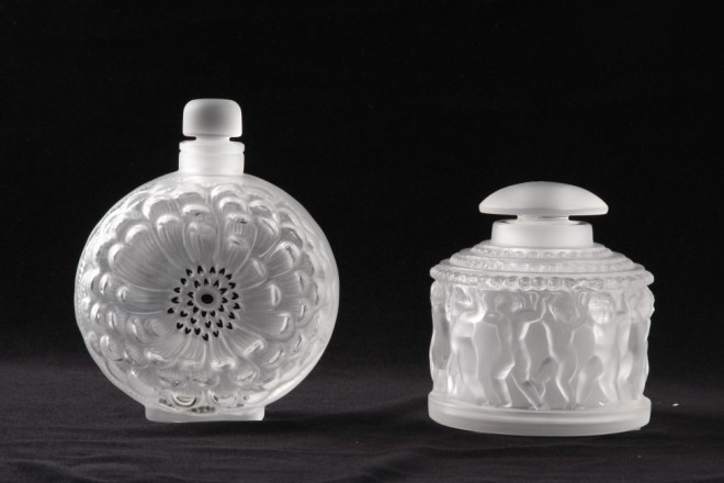 Appraisal: Lot of two One Lalique crystal jar features putti holding