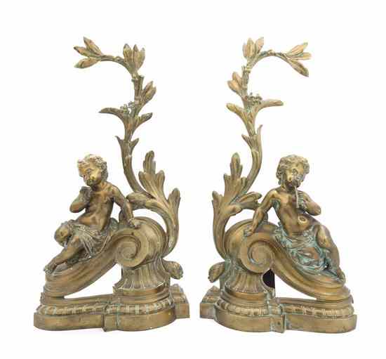 Appraisal: A Pair of French Gilt Metal Chenets each depicting a