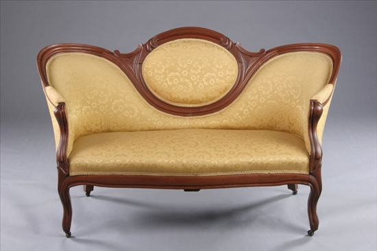 Appraisal: AMERICAN ROCOCO REVIVAL WALNUT SERPENTINE-BACK GOLD UPHOLSTERED SETTEE th century