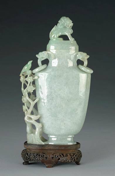 Appraisal: A good pale greenish-white jade covered vase with bird decoration