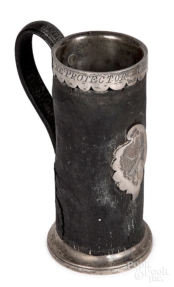 Appraisal: English silver mounted leather tankard English silver mounted leather tankard