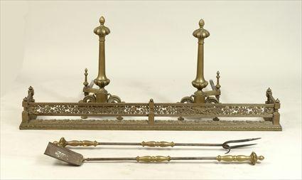 Appraisal: Pair of Baroque-Style Brass Andirons Neoclassical-Style Pierced Brass Fire Fender