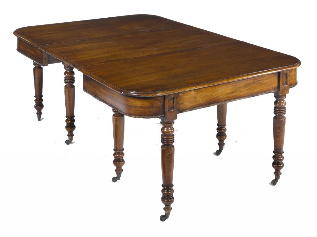 Appraisal: A MAHOGANY EXTENDING DINING TABLE the 'D' shaped ends with