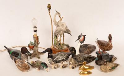 Appraisal: A quantity of carved and painted wooden birds the largest