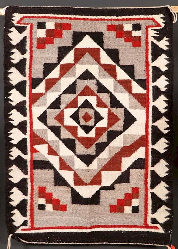 Appraisal: A SOUTHWEST NAVAJO HANDWOVEN WOOL RUG CIRCA A SOUTHWEST NAVAJO