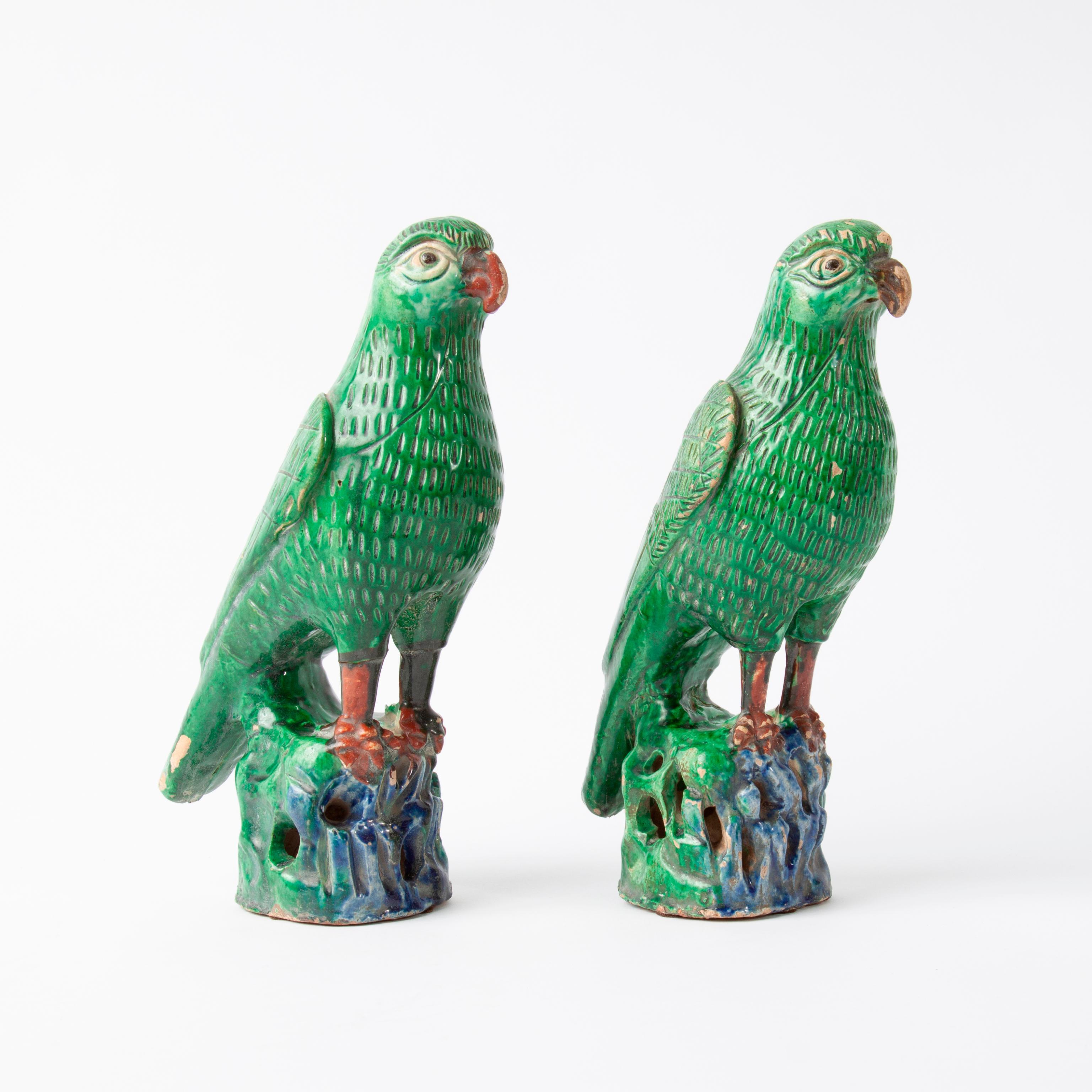 Appraisal: CHINESE SANCAI GLAZED EARTHENWARE BIRDS PAIR A pair of Chinese