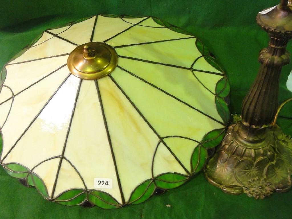 Appraisal: A table lamp in the Art Nouveau manner with leaded