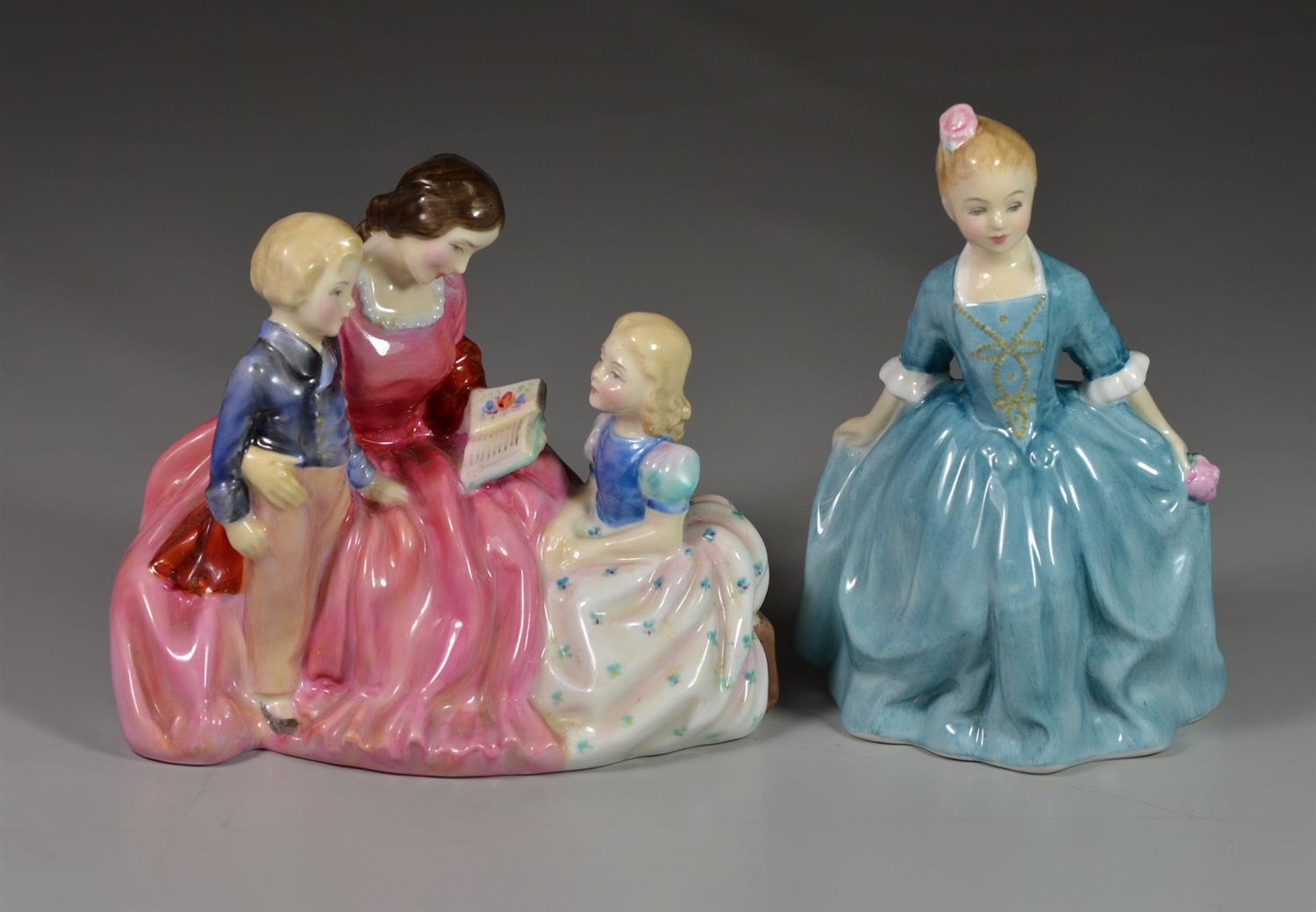 Appraisal: Royal Doulton bone china figurines Bedtime Story HN A Child