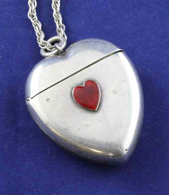 Appraisal: A late Victorian silver and enamelled heart shaped vesta case