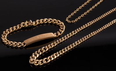 Appraisal: An k gold curb link identity bracelet cm long approximately