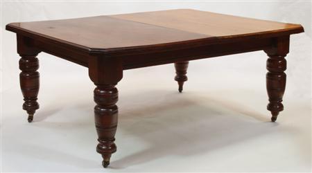 Appraisal: A Victorian oak extending dining table the moulded rectangular top