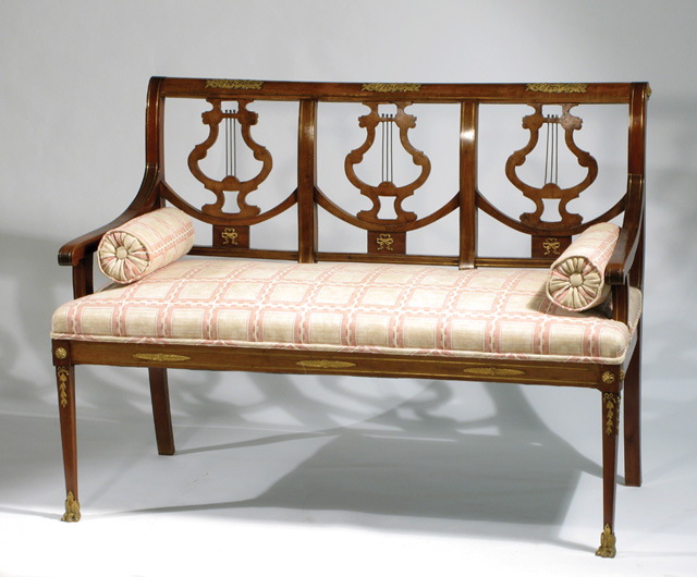 Appraisal: LOUIS XVI STYLE TRIPLE LYRE-BACK SETTEE French early th century