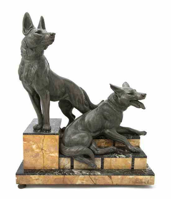 Appraisal: A Continental Cast Metal Figural Group depicting two German Shepherds