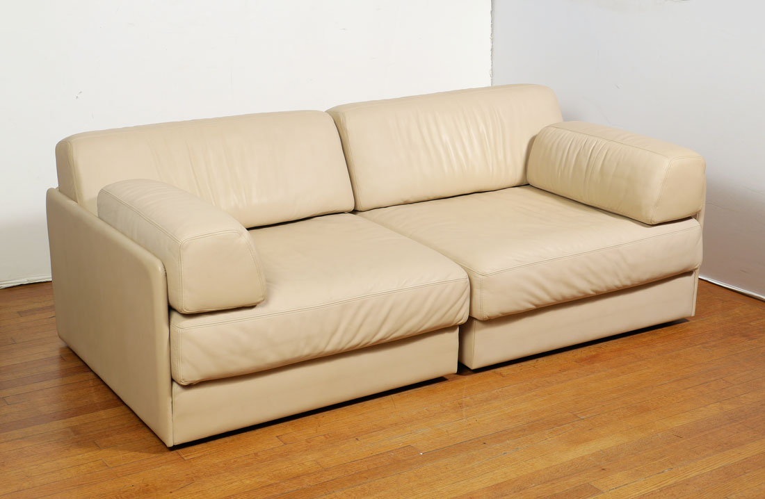 Appraisal: DE SEDE PIECE CONVERTIBLE SECTIONAL LOVESEAT Cream leather upholstered sectional