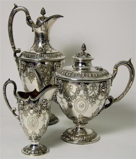 Appraisal: A late Victorian three piece plated tea service Martin Hall