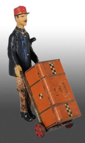 Appraisal: Tin Lehmann Adam the Porter Wind-Up Toy Description German Working