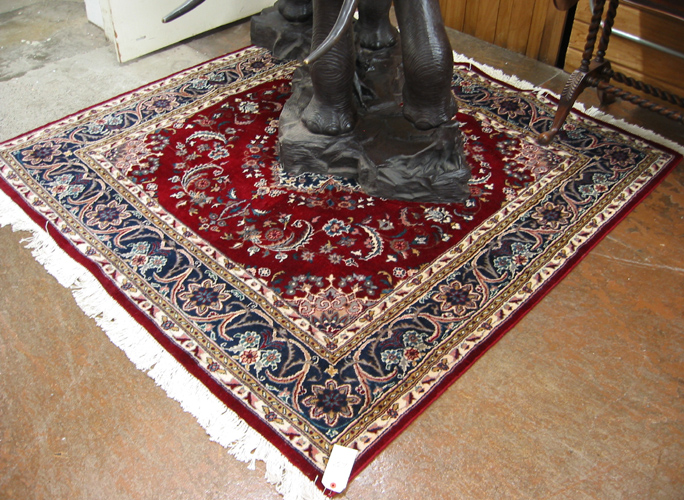 Appraisal: SQUARE ORIENTAL CARPET Indo-Persian hand knotted wool pile ' x