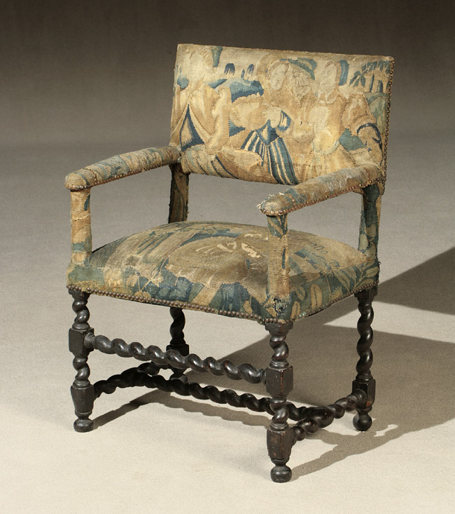 Appraisal: Flemish Baroque Walnut and Verdure Tapestry Upholstered Armchair Predominantly th