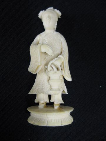 Appraisal: Chinese Carved Ivory Figurine of a Lady holding a basket