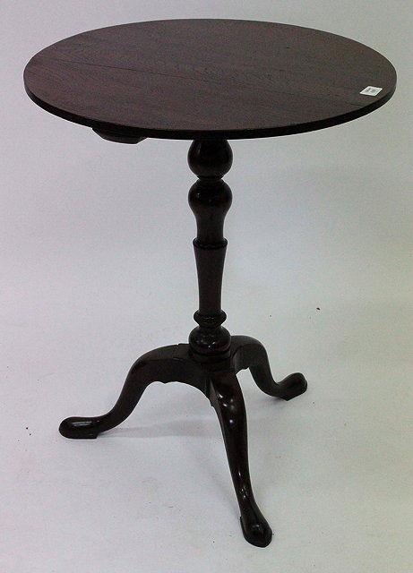 Appraisal: A MAHOGANY CIRCULAR TRIPOD TABLE with turned column support cm