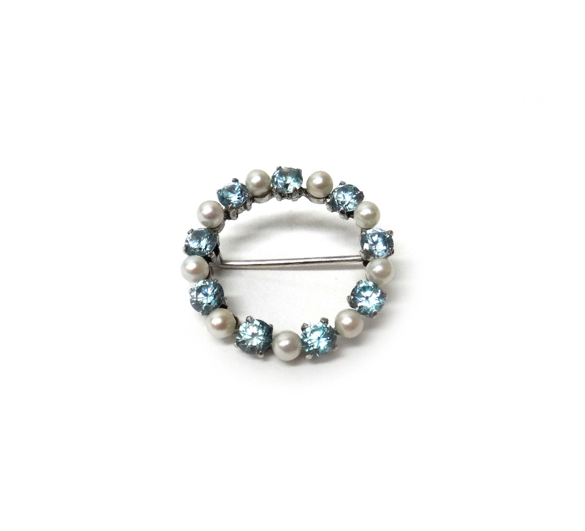 Appraisal: A ct white gold blue zircon and cultured pearl set