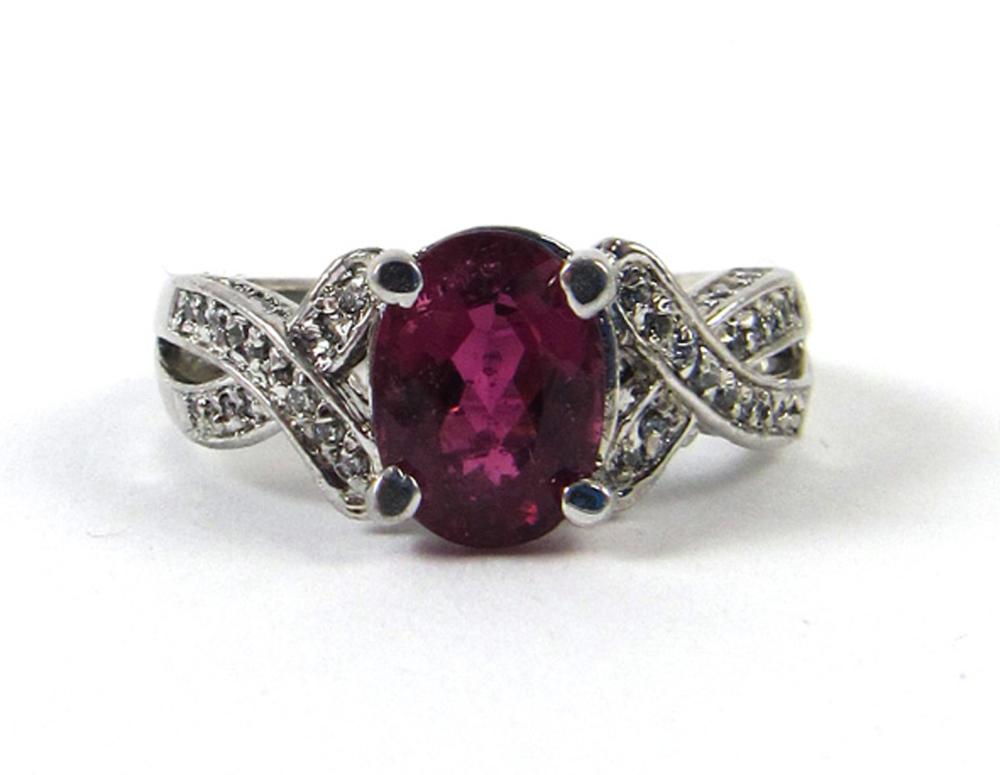 Appraisal: PINK TOURMALINE AND FOURTEEN KARAT GOLD RING The k white