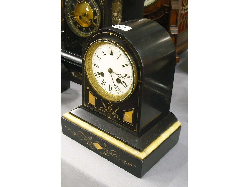 Appraisal: Black slate and yellow marble two train mantel clock the