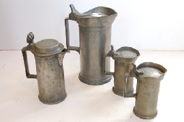 Appraisal: GROUP OF FOUR TH CENTURY PEWTER LIDDED MEASURES