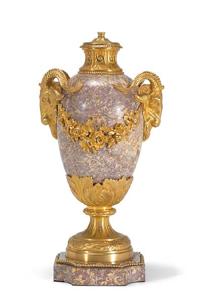 Appraisal: A Louis XVI style gilt bronze mounted variegated marble urn