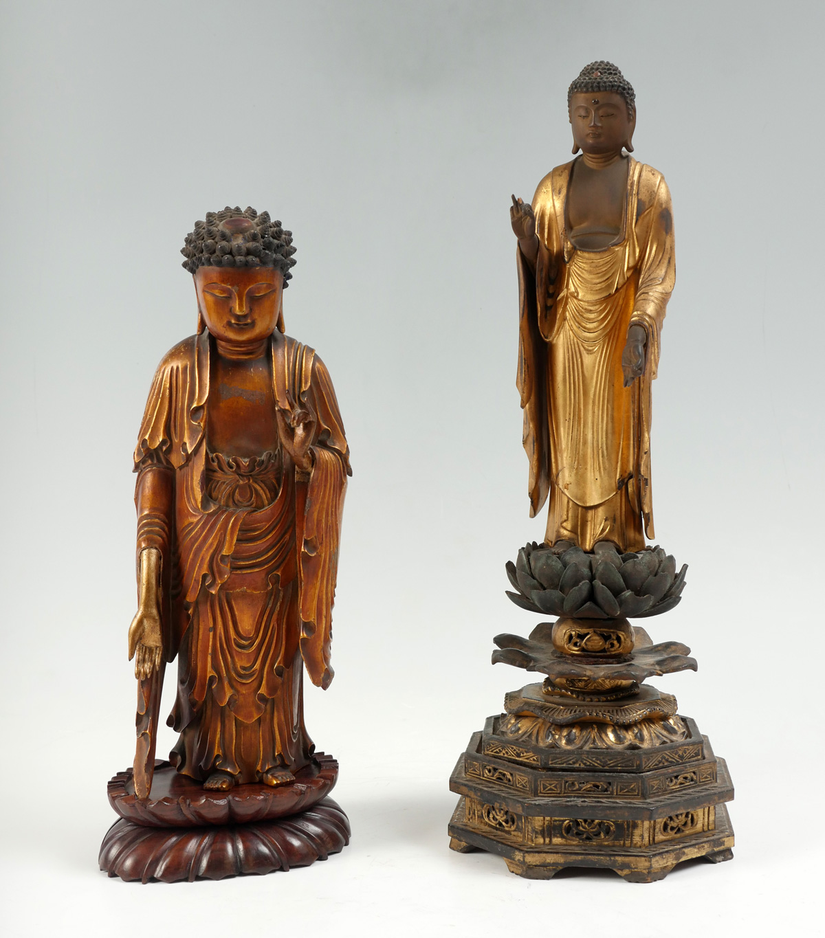 Appraisal: PIECE CARVED WOOD JAPANESE BUDDHA STATUES - carved wood Japanese