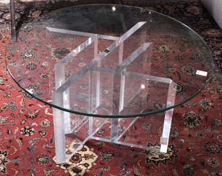 Appraisal: Moderne acrylic low table having a plate glass circular top