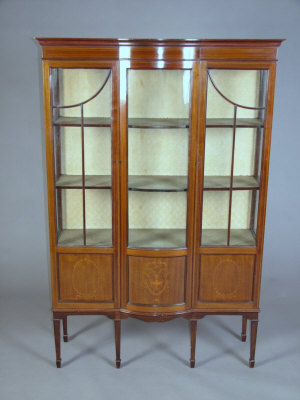 Appraisal: An Edwardian mahogany and inlaid display cabinet the cornice above