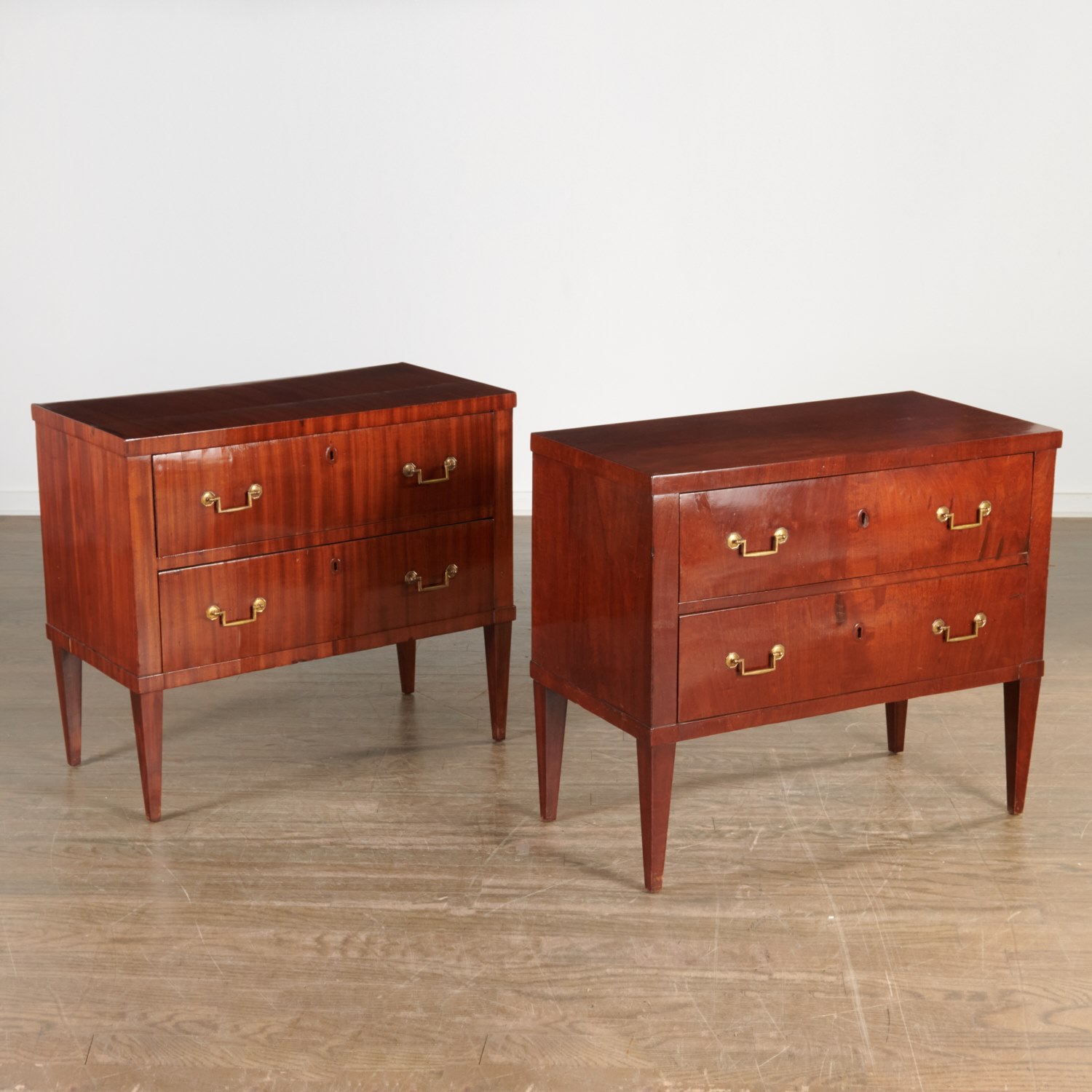 Appraisal: PAIR NORTHERN EUROPEAN PETIT COMMODES Early th c mahogany veneer